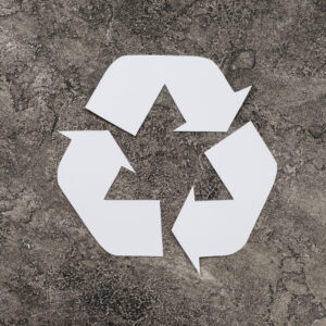 white-symbol-recycling-dirty-background